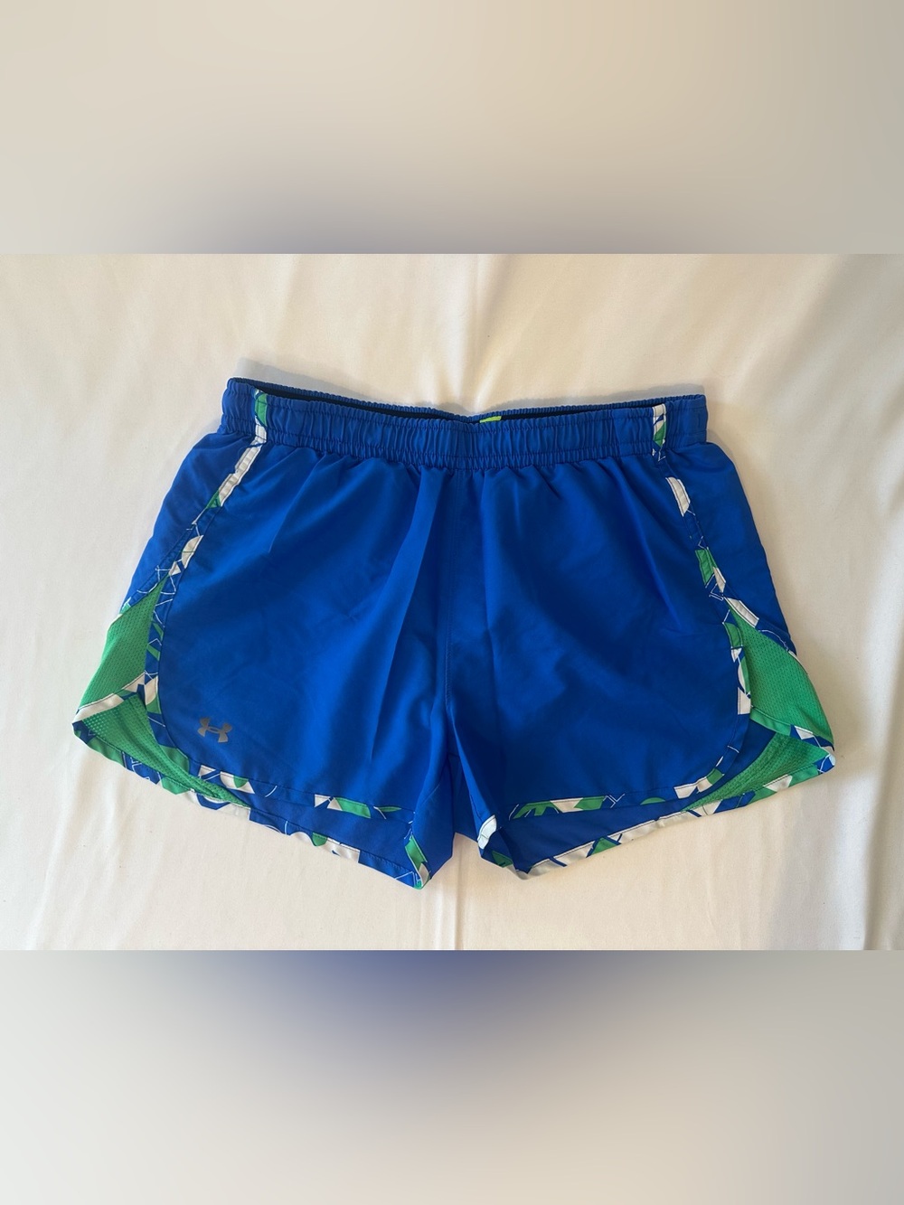 Under Armour Women’s Royal Blue Athletic Shorts with Green Accents